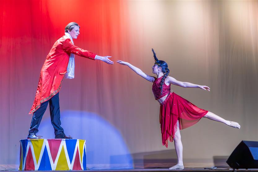 Students perform onstage
